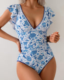 Traje de baño de una pieza con escote en V floral y control de abdomen