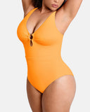 Traje de baño de una pieza con control de abdomen y escote en V profundo