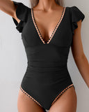 Traje de baño de una pieza con escote en V floral y control de abdomen