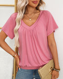 Top fruncido de mujer con cuello de pico holgado