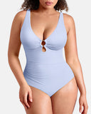 Traje de baño de una pieza con control de abdomen y escote en V profundo