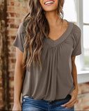 Top fruncido de mujer con cuello de pico holgado