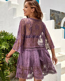 Vestido de playa con cuello de pico y encaje floral