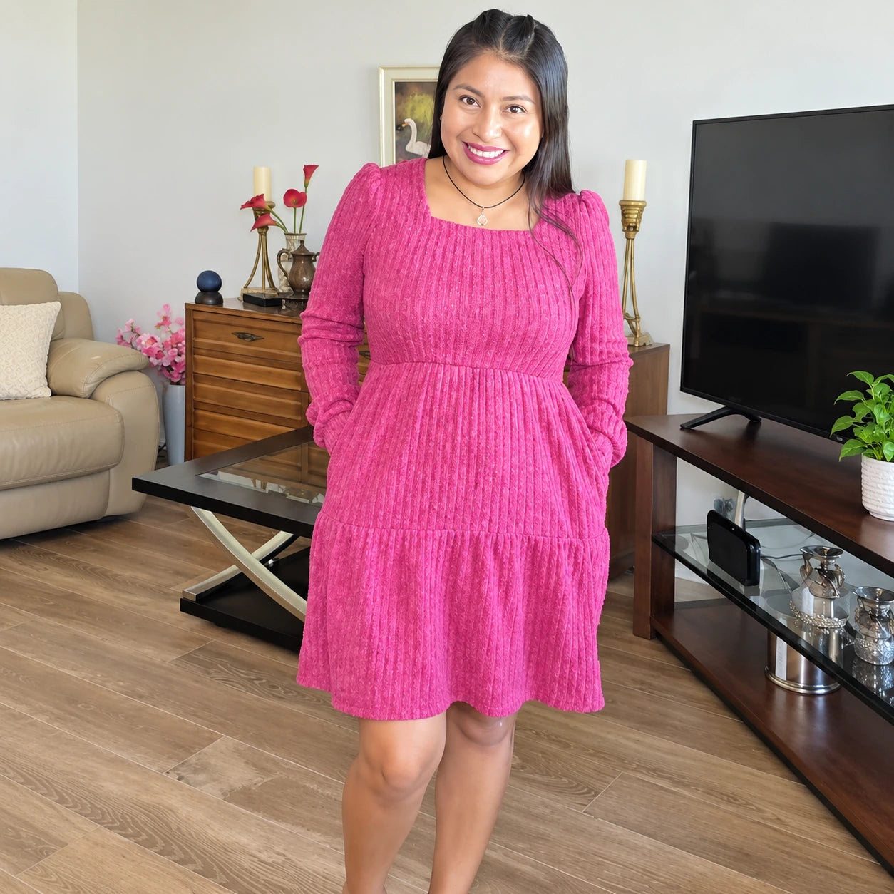 Cream square-neck dress styled with brown tall boots