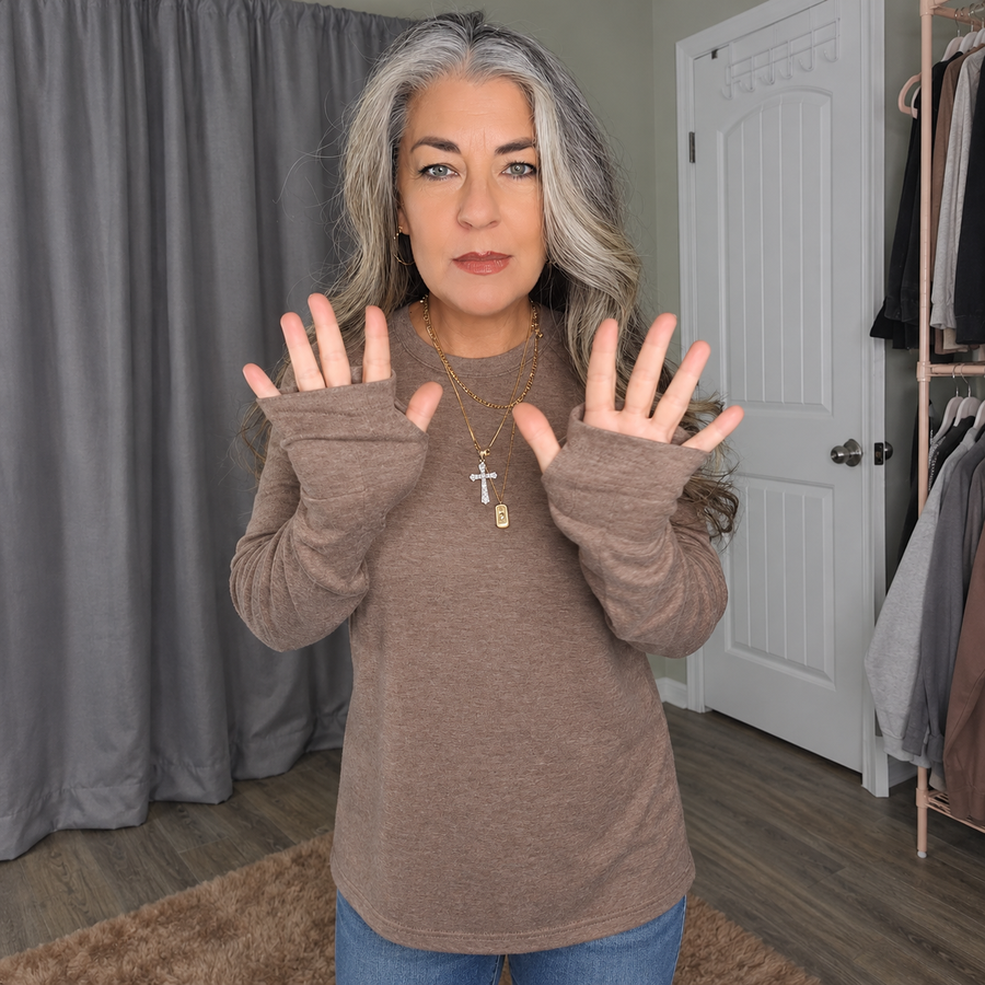 Brown top showing the thumbhole cuffs